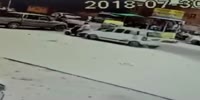 Scooter rider gets crushed against the pick truck by another vehicle