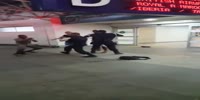 Guy armed with flip flops attacks an airport guard