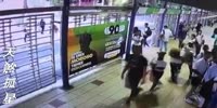 Thief fleing from a cop runs under the bus
