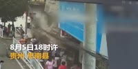 Board falls on pedestrians in China