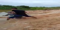 Asshole throws his mom into the river