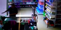 Armed dude calmly robs a store