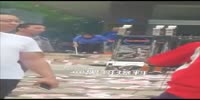 Old woman pollutes the street with money