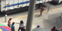 Street fight stopped by a knife wielding man