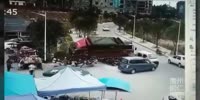 Two red trucks collide due to Chinese way of driving