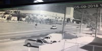 Speeding biker wrecks into the turning car and dies on spot