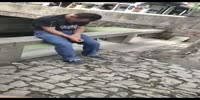 Dramatic Drunk man falls into the canal