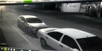 Speeding biker wrecks into the parked car