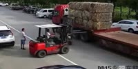 Scooter rider crashes into forklift blades