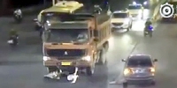 Scooter Girl vs. Dump Truck