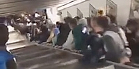 Terrifying Moment Football Fans Pounded by Broken Escalator