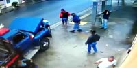 Woman can`t see a shit cause of her umbrella and gets run over by reversing truck