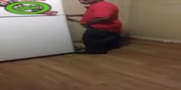Drunk black male attacks white fridge
