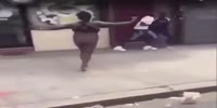 Naked black woman scares people in the streets