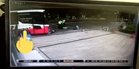 Two Scooter Riders Race Each Other Head-on into a Bus