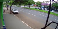Red Light Runner Smashes into a Couple on a Bike