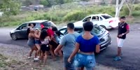 Girls fight causing chaos on the road