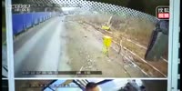 Motorcyclists slip and fall under the bus