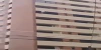 Man jumps off a tall building