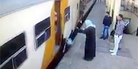 Girl Falls Under Train