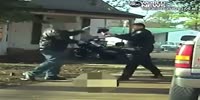 Oklahoma cop shoots an armed suspect 3 times