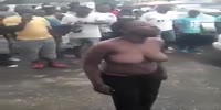 Topless African woman fights her BF