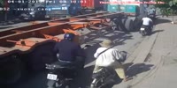 Woman gets both legs crushed by huge truck