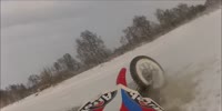 Dumb biker drowns in frozen lake