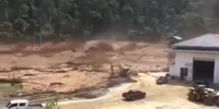 Dam collapse causing streams of mud kill & destroy