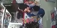 Female cashier beaten by aggressive robber