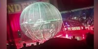 Motorbikes collide inside metal dome during circus show