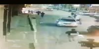 Woman crossing the road gets struck by car