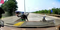 Viet motorgirl slides under the dashcam car