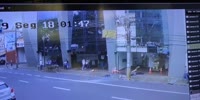 Hospital wall collapses nearly killing pedestrians