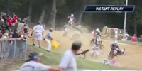 Motor crosser gets rag dolled to a pile of broken bones.