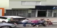Girl faints being strangled in street fight