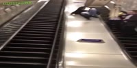 Drunk Londoner on escalator