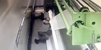 Worker Rolled into Machine