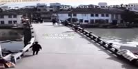 WTF : man throws wife off the bridge