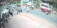 Ambulance rams scooter riders
