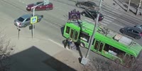 Babushka gets knocked by trolley bus