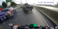 Biker wrecks into suddenly stopped pick up truck