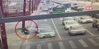 Red circle of death targets a scooter rider.