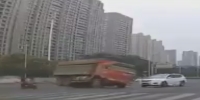 Overturning Red truck buries them all alive