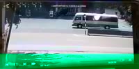 Motorcyclist runs into a turning bus.