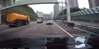Dashcam captures water tanker suddenly rolling over on highway