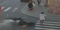 Sliding bike breaks woman`s legs