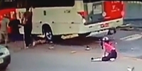 Girl Falls Under Bus