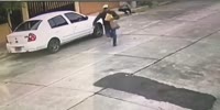 Purse snatcher punches a woman CCTV