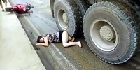 Girl Begging For Help Under Truck Tire